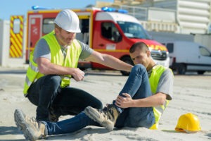 construction worker with injured leg at work